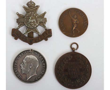 A British War Medal to the Nottinghamshire and Derbyshire Regiment with sports medals. British War Medal, “14739 PTE. G. WOOT