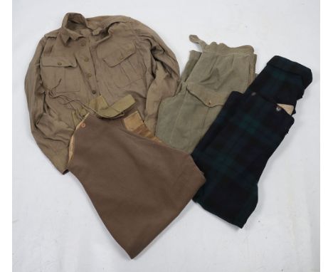 WW2 Denim Battledress Blouse: Stamped inside and complete with buttons, pair of jungle green trousers, pair of tartan Trews a