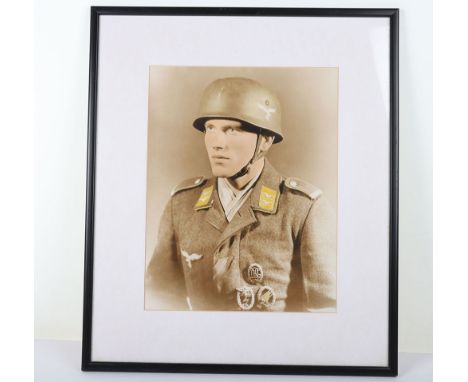 Framed Portrait Photograph of Well Decorated Luftwaffe Paratrooper. Period colorized photo 34 x 27 cm showing a German Fallsc