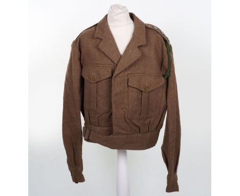 Captain’s Royal Army Dental Corps Battle Dress Blouse, 1949 pattern blouse with insignia. The Royal Army Dental Corps titles 