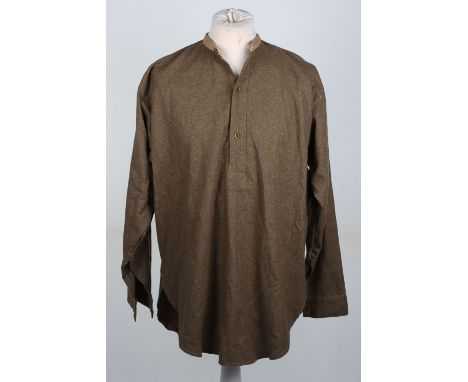 British Army Shirts: Two WW2 vintage army officers’ collarless shirts one with makers label and a later made example. 3 items