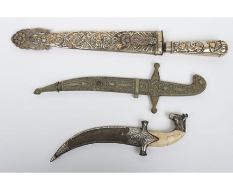 Argentinian Gaucho Knife: Large decorative hilt and scabbard Gaucho knife with 28 cm blade with makers stamp, overall, 47 cm 