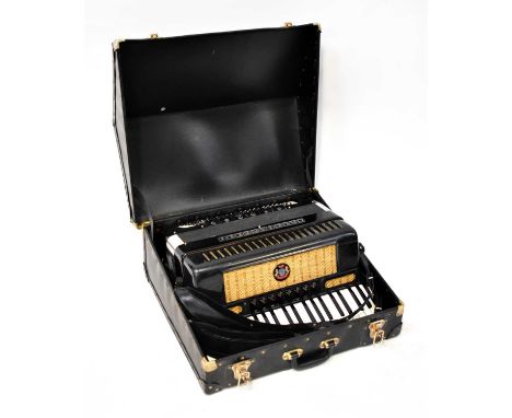 CRUCIANELLI; an electric piano accordion, in fitted hard case.