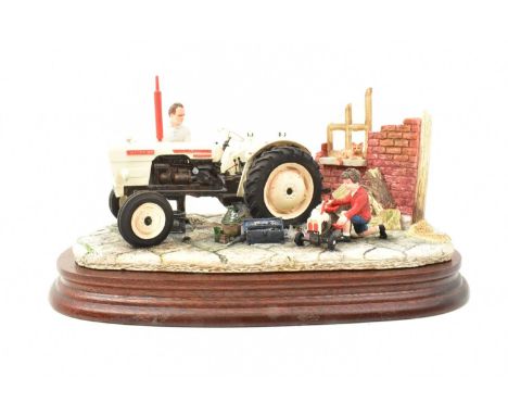 BORDER FINE ARTS; a tractor figure group, 'Like Father, Like Son', model no. B0859, a white tractor with boy and tractor, on 