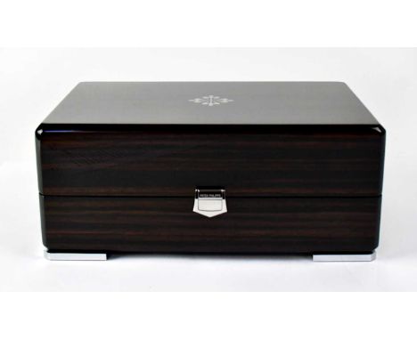 PATEK PHILLIPE; an empty lacquered fitted watch box with silver-coloured fastener and feet, and logo to the lid, approx. 10 x