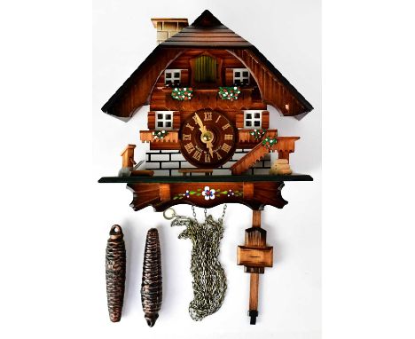 HUBERT HERR; a Black Forest cuckoo clock in the form of a chalet, the dial set with Roman numerals and inscribed 'Made in Ger