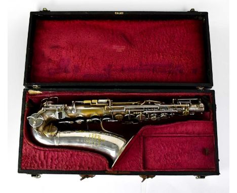 ADOLPHE SAX; a cased silver-plated alto saxophone, inscribed 'Medaille D'Or 1900, Adolphe Sax, Feur de L'Académie Mle de Musi