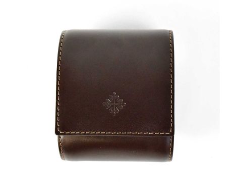 PATEK PHILIPPE; a branded leather watch travel case, in original outer card box, approx. 9.5 x 8 x 6.5cm.Condition Report: Re