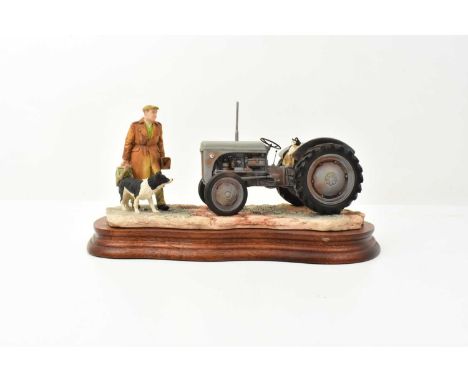 BORDER FINE ARTS; a tractor figure group, 'An Early Start', model no. JH91, a grey tractor with man in coat, on wooden plinth