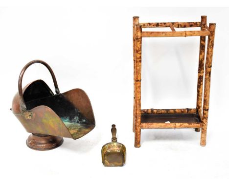 A copper helmet-shaped coal scuttle with shovel, and a bamboo two-division umbrella stand with plastic drip tray (2).