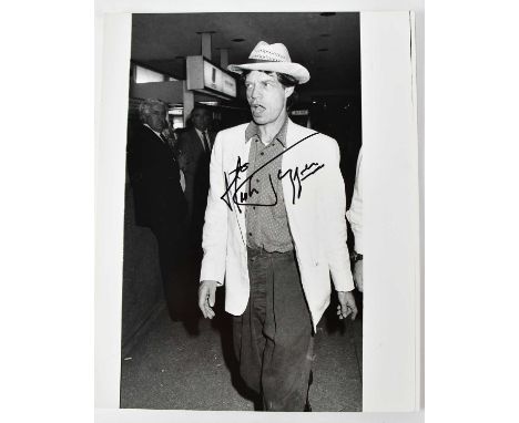 MICK JAGGER; a signed black and white photograph, 25.5 x 20cm.Condition Report: We have not authenticated these signatures, p
