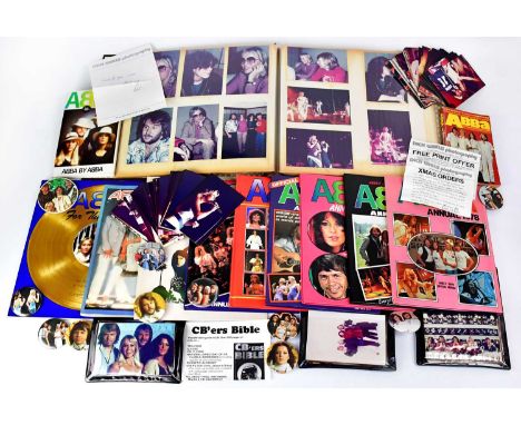 ABBA; a quantity of books, ephemera and memorabilia, to include ten metal-backed pin badges, diameter of each 5.6cm, a larger