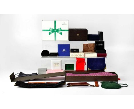 A quantity of watch and jewellery boxes to include Rolex, a boxed Patek Philippe tie, watch straps, etc.