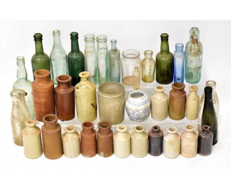 A large quantity of ceramic and glass bottles of varying ages, mainly 19th century, including marble bottles (4).