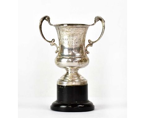 W. A. HUMPHRIES LTD; an Elizabeth II hallmarked silver trophy cup on black plastic stand, inscribed 'B.G.C. Martin Cup R. Edd