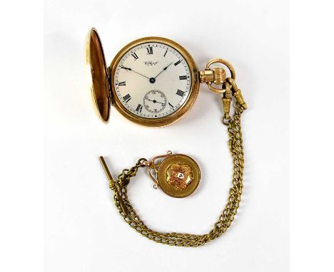 WALTHAM; a gold-plated full hunter crown wind pocket watch, the white enamelled dial set with Roman numerals and subsidiary s