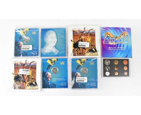 S A MINT; four 2000 uncirculated commemorative proof five rand cupro nickel coins, with Nelson Mandela portrait, two South Af