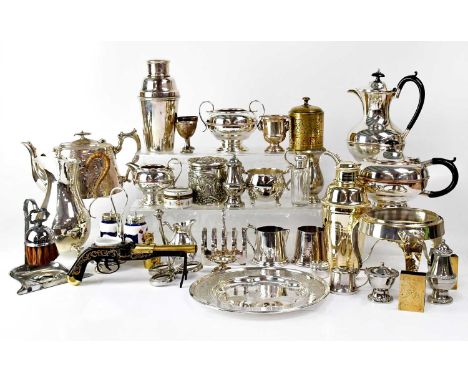 A quantity of plated ware, to include teapots, cocktail shakers, a cruet set on stand, a toast rack, jugs, a ceramic cruet se