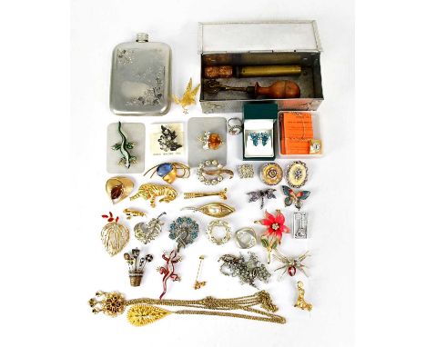 A quantity of modern and vintage costume jewellery including brooches, a small fob clock on gold-plated necklace, earrings, a