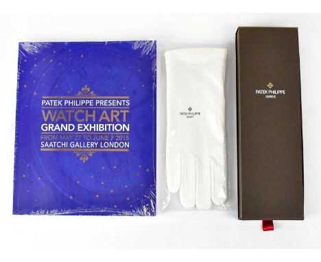 PATEK PHILIPPE; a boxed pure silk red tie, a pair of white satin gloves, and a 'Watch Art Grand Exhibition Saatchi Gallery 20