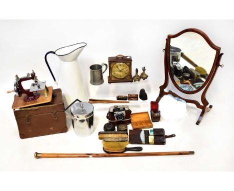 A collectors' lot including a large enamelled milk pitcher, an Edwardian mahogany shield-shaped swing mirror, a tiger ice buc
