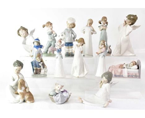 LLADRÓ; eleven figures including three cherubs in nightgowns, two bells with pixie finials, etc, and three further Nao exampl