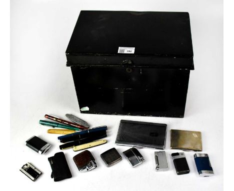 A collectors' lot, to include two engine turned cigarette cases, three vintage fountain pens, including a Savoy example, two 