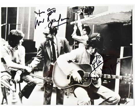 THE ROLLING STONES; five black and white promotional photographs, comprising three signed examples, Mick Jagger, Keith Richar