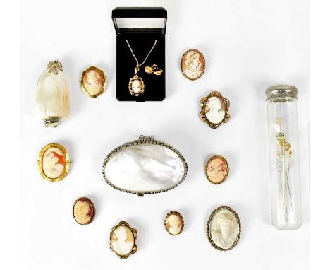Ten vintage cameo and cameo-style brooches, together with a pair of clip-on cameo earrings in gold-coloured mounts, a cameo p