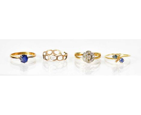 Two 9ct yellow gold rings, comprising an example set with a single blue stone, size K, and a pierced ring, size J, combined a
