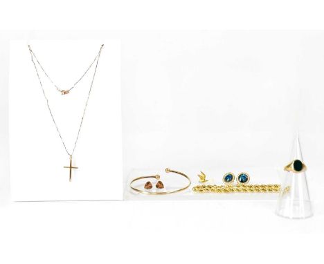 A group of 9ct yellow gold jewellery, comprising a ropetwist bracelet with safety chain, length approx. 18cm, a torc bangle, 