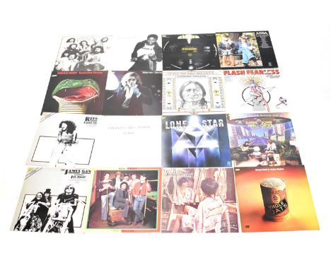A quantity of vinyl LPs to include Uriah Heep 'Innocent Victim, Warren Zevon 'Frank and Jesse James', Emerson Lake &amp; Palm