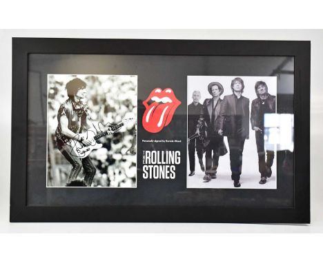 THE ROLLING STONES; a framed montage containing a signed black and white photograph of Ronnie Wood and a black and white phot