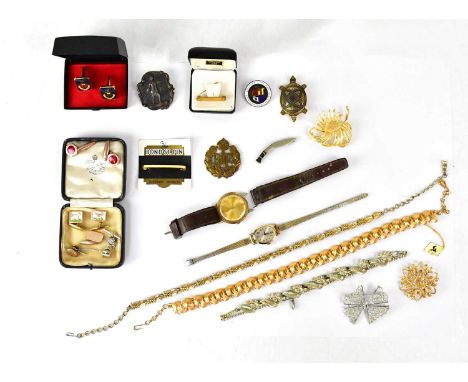 A group of vintage costume jewellery, to include a hallmarked silver badge inscribed 'Chester Diocesan Training College 1839'