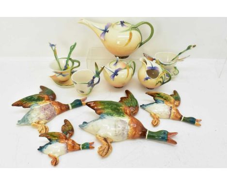 FRANZ; a twelve-piece part tea set comprising teapot, length 26cm, milk, sugar, lidded jar, two cups and saucers, and two spo