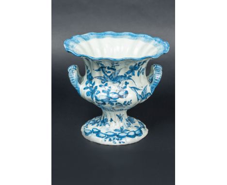 Savona Ceramic Vase, with two handgrips , fluted round shape, blue painted decorations on white ground, glazed . 18Th Century
