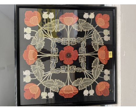 A framed embroidered panel of poppies by Monica Ashdown, born 1903. c.1920. 22' x 22'