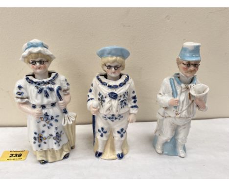 Three continental nodding ceramic figures. 6½' high