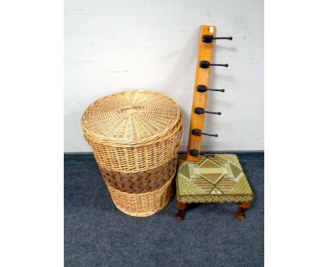 A wicker laundry basket with lid together with a six hook coat rack, tapestry upholstered footstool 