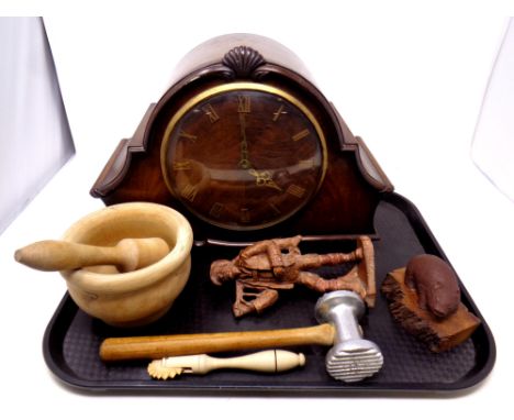 A tray of oak cased Smiths mantel clock (battery operated), wooden pestle and mortar, carved wooden figures