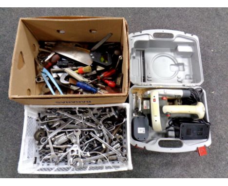 A box and crate of hand tools, ring spanners, performance electric saw in case 