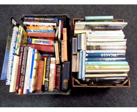 A crate and box of hardback and soft back books, Painters, Picasso, Monet, Lowry etc 