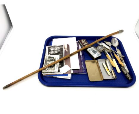A military swagger stick together with cutlery, pen knives, commemorative first day covers, cigarette cards, oxo tin, Victori