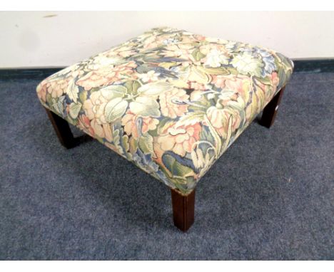 A twentieth century oversized tapestry footstool 