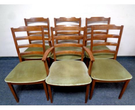 A set of six twentieth century teak G-plan ladder backed chairs comprising of two carvers and four singles 