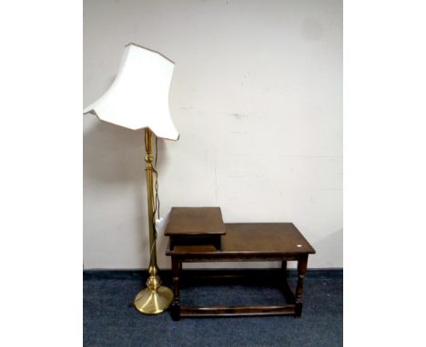 A telephone table in an oak finish together with a brass floor lamp with shade 