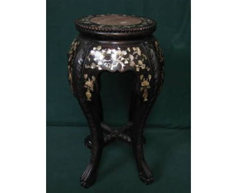 HEAVILY CARVED ORIENTAL PLANT STAND WITH MARBLE INSERT AND MOTHER OF PEARL DECORATION, ON CLAW SUPPORTS, APPROXIMATELY 57cm H