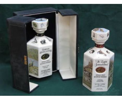 CASED GORDON HIGHLANDER COMMEMORATIVE DECANTER AND ANOTHER SIMILAR UNBOXED DECANTER 