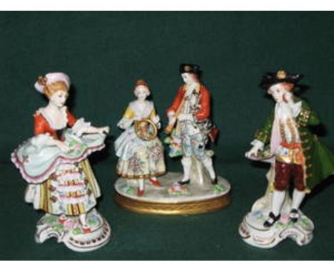 PAIR OF CONTINENTAL STYLE HANDPAINTED CERAMIC FIGURES AND A SIMILAR CONTINENTAL STYLE FIGURE GROUP