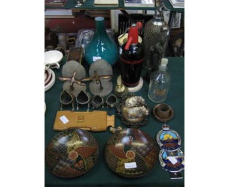 PAIR OF CLOISONNE PLAQUES, TIE PRESS, TWO CAR BADGES, BOOK ENDS, GLASS BOTTLE, SOAPSTONE FIGURE, TWO SODA SYPHONS, CIGARETTE 
